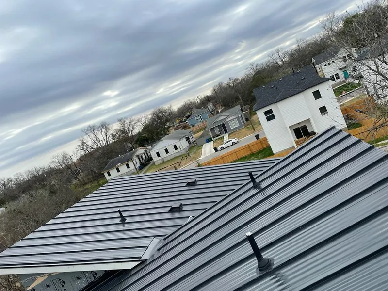 Standing seam metal roof panels with vents for Skylight Repair in Mooresville